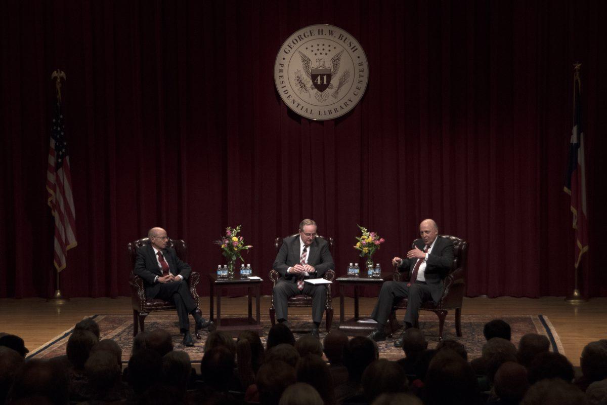 Stanford international relations professor Stephen Krasner, Dean of the Bush School Mark A. Welsh III and former Ambassador John Negroponte on stage at the Annenburg Presidential Conference Center.