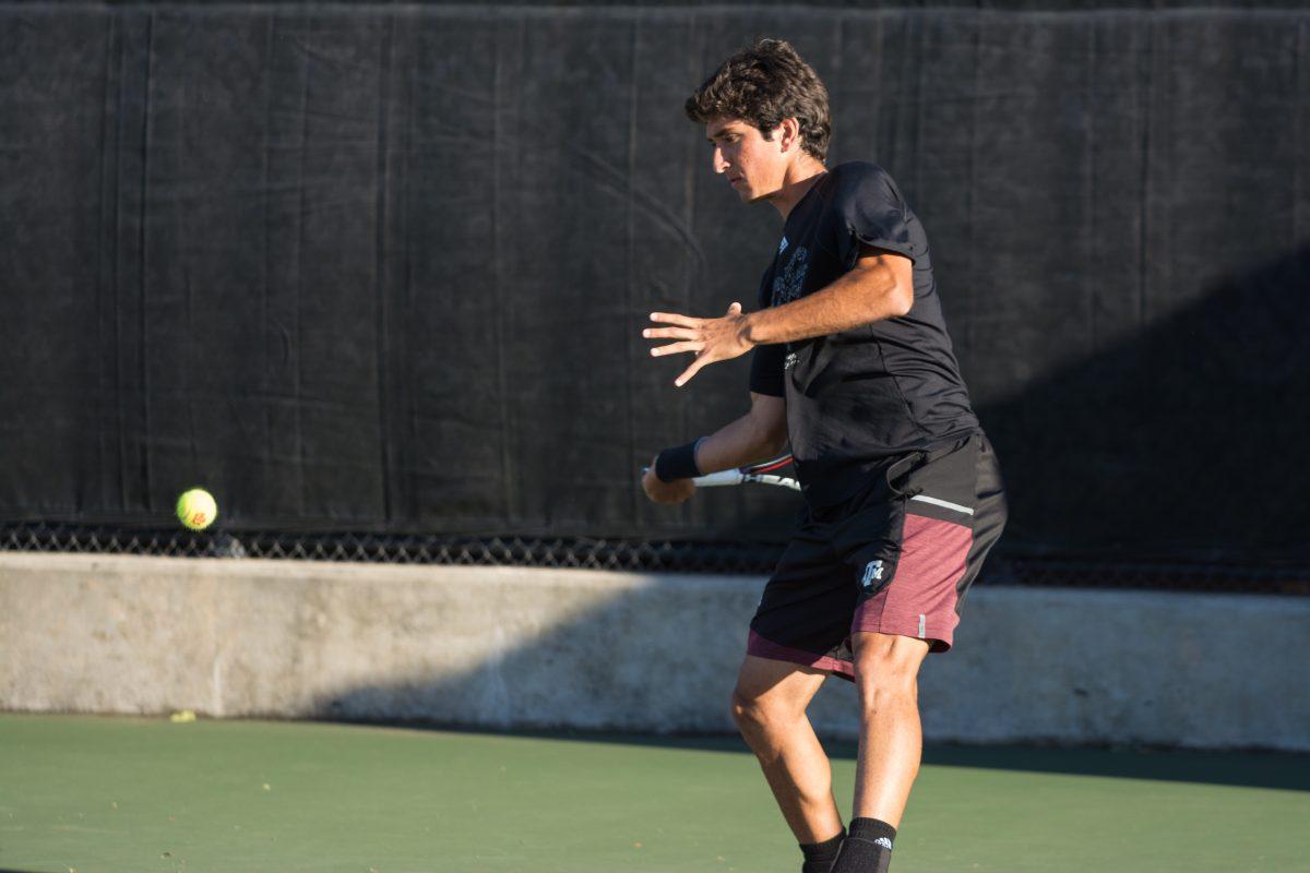 Freshman Hady Habib&#160;prepares to return the ball.