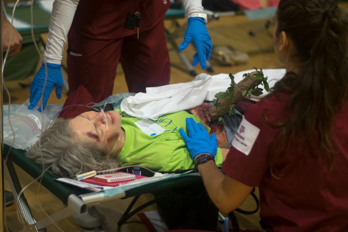 Bryan resident Loretta Bender volunteered to be a victim of the hurricane scenario, suffering several cuts, lacerations, and a branch stuck in their abdomen for Disaster Day 2017.