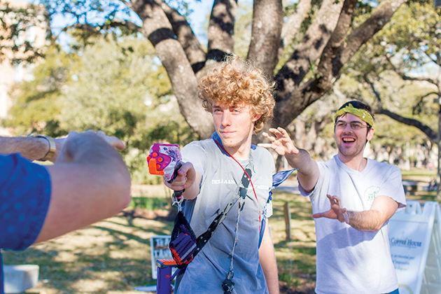 Science and technology editor Joshua Hopkins (center) acted as the head moderator for Aggieland Urban Gaming Society during their semesterly Human Versus Zombies games.