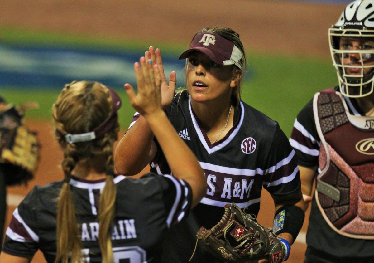 Lexi Smith congratulates Riley Sartain.