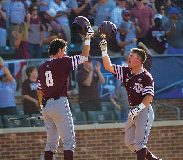 Logan+Foster+celebrates+his+second-inning+home+run+with+Braden+Shewmake.
