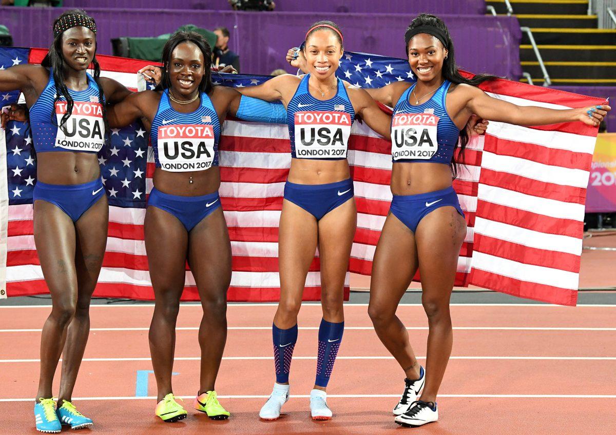 US 4x100m winning team of Tori Bowie, Morolake Akinosun, Allyson Felix and Aaliyah Brown withe the American flag, the US won with a time of 41.82sec. at the 16th. IAAF World Outdoor Track & Field Championships held in London on Saturday, August 12, 2017. Photo by Errol Anderson