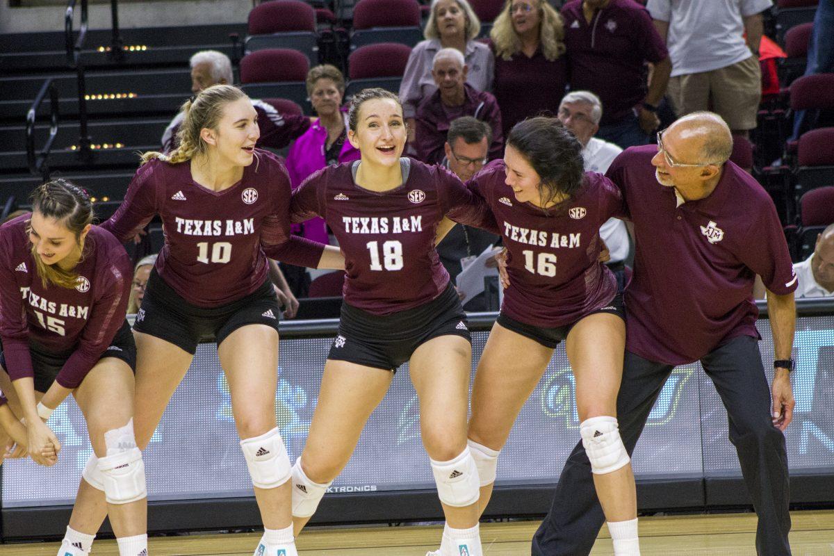 The+Aggie+Volleyball+Team+sings+The+War+Hymn+after+a+three+set+victory+against+the+VCU.
