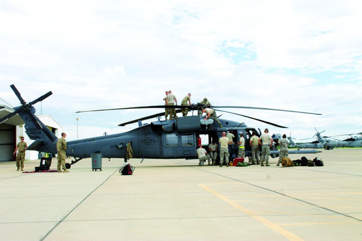 Airmen+from+the+920th+Rescue+Wing+out+of+Patrick+Air+Force+Base%2C+Florida+prepare+a+helicopter+for+final+inspection+before+being+deployed+to+Houston+to+assist+in+rescue+efforts.