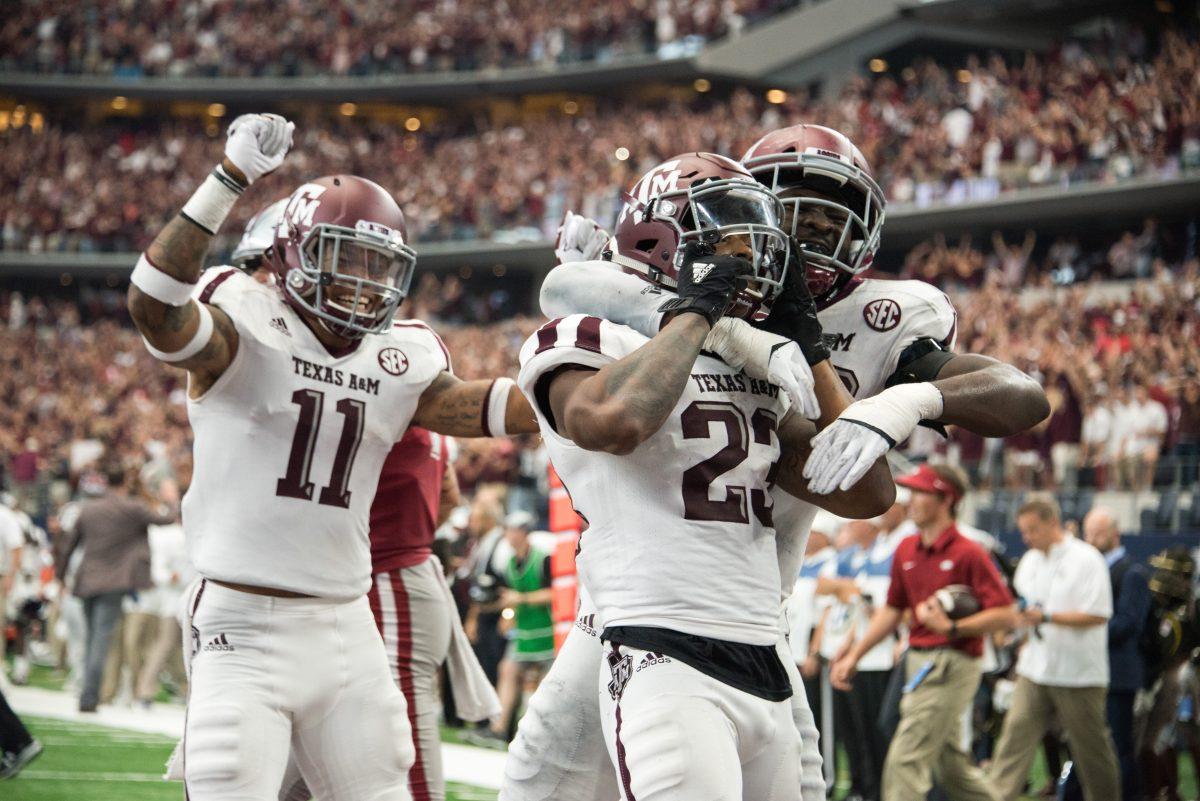 Senior Armani Watts intercepts the ball at the end of overtime to seal the Aggies' victory over Arkansas.