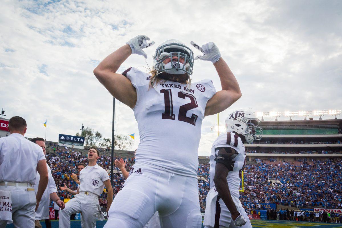 Junior linebacker Cullen Gillaspia is full of energy as he runs out onto the field and pumps up the crowd. 