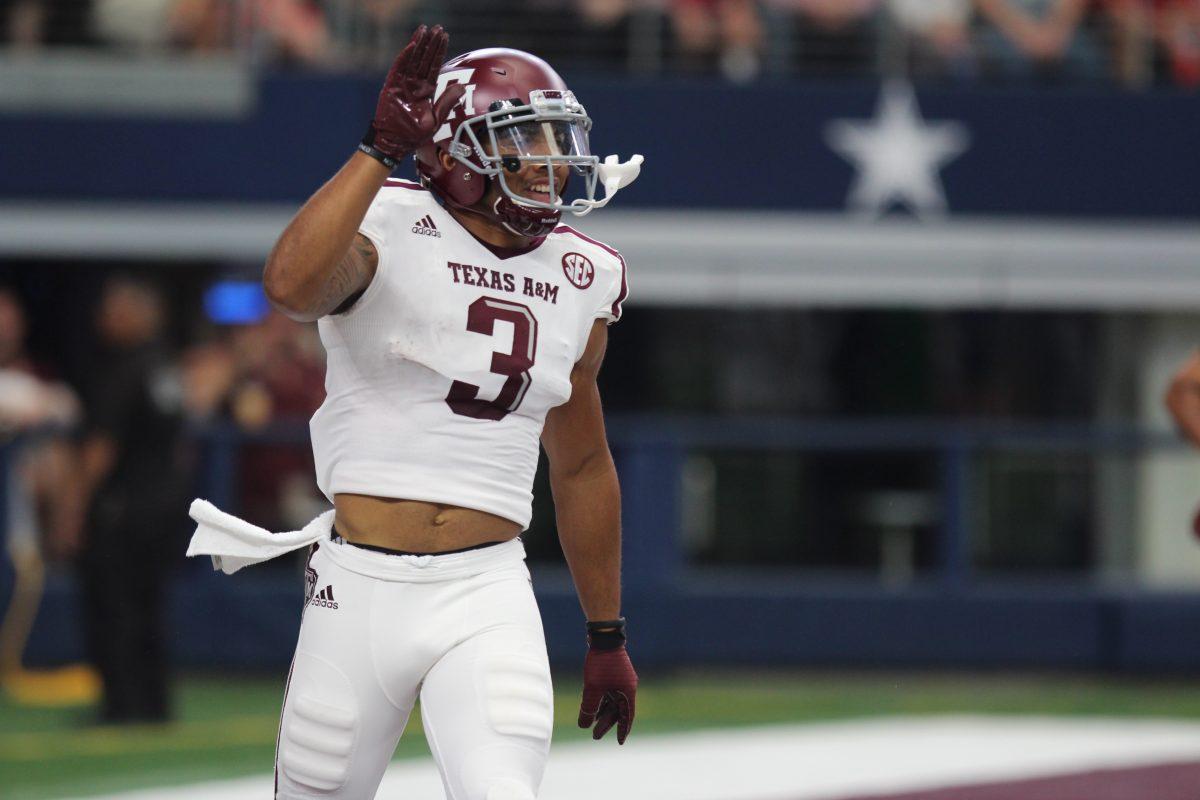 Junior Christian Kirk&#160;celebrates after his 81 yard touchdown catch. This career long catch was one of his three touchdowns of the day.