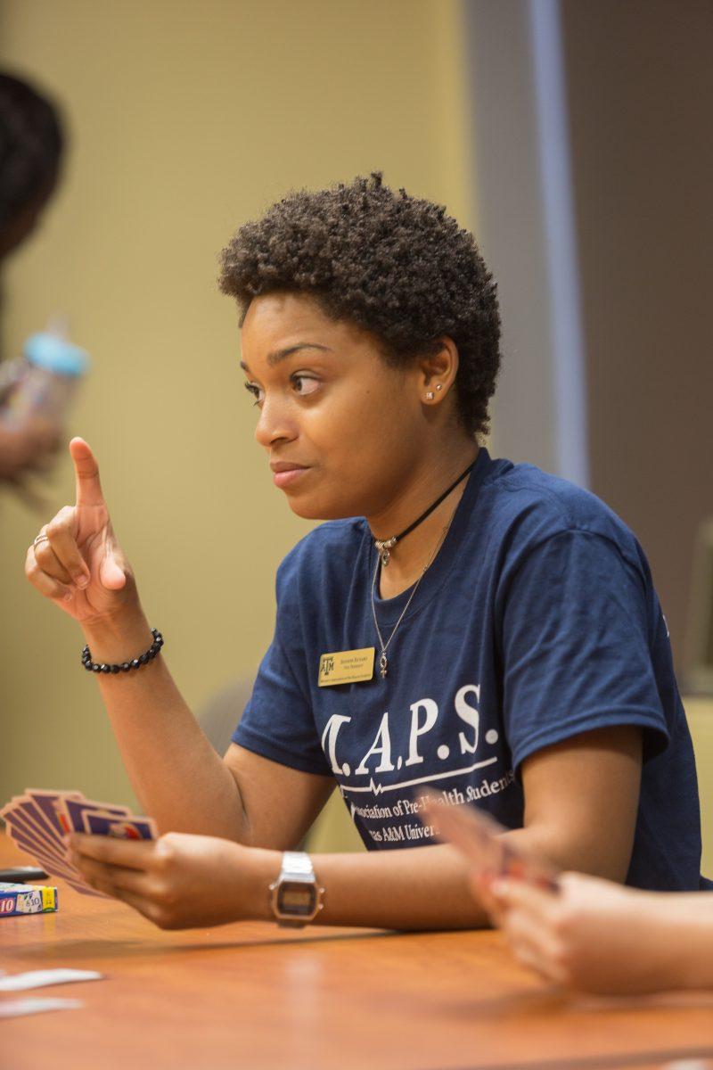 Jennifer Richard, pre-medical and psychology senior and vice president of MAPS, talks with her members at a M.A.P.S meeting.&#160;