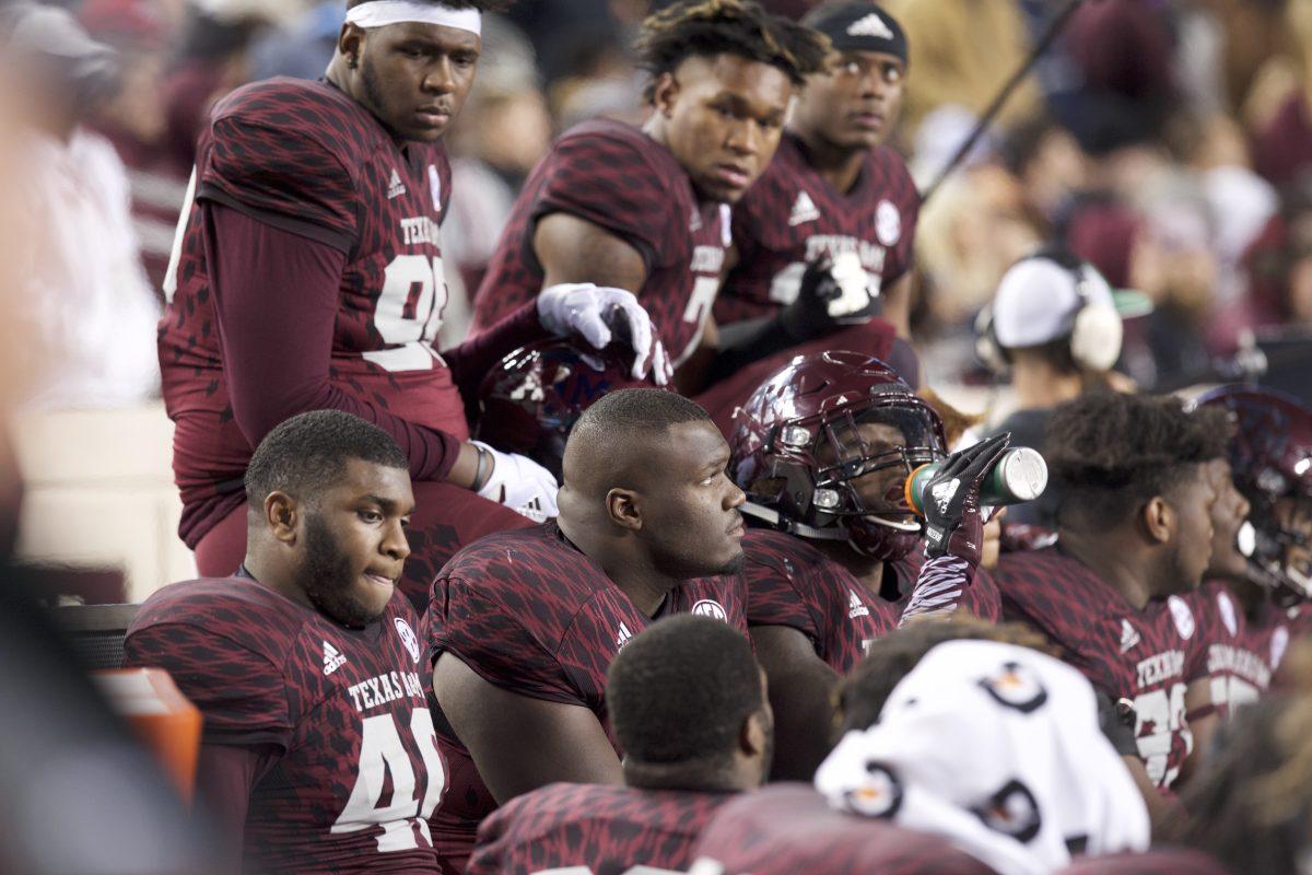 After Mond gets sacked, the Aggie bench looks as the clock winds down to halftime with a 14-0 Mississippi State lead. 