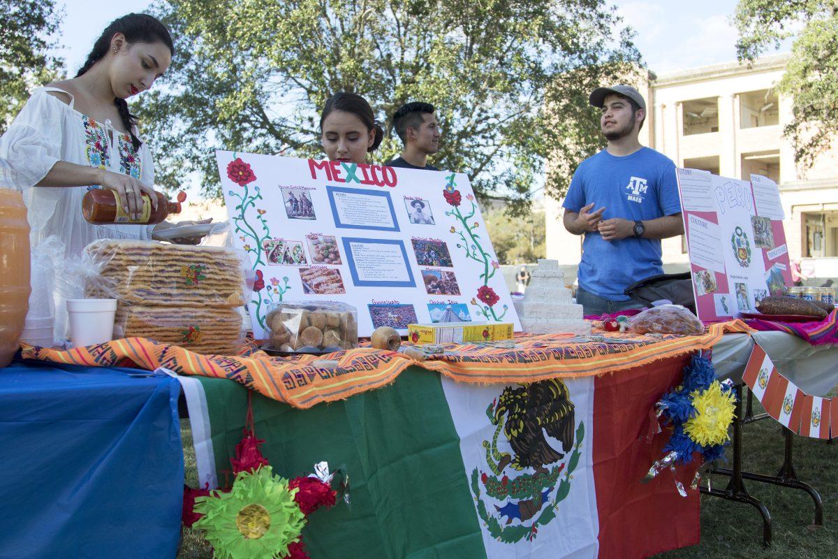 Students at the heritage food event present food and facts about Mexico (left) and Peru (right).