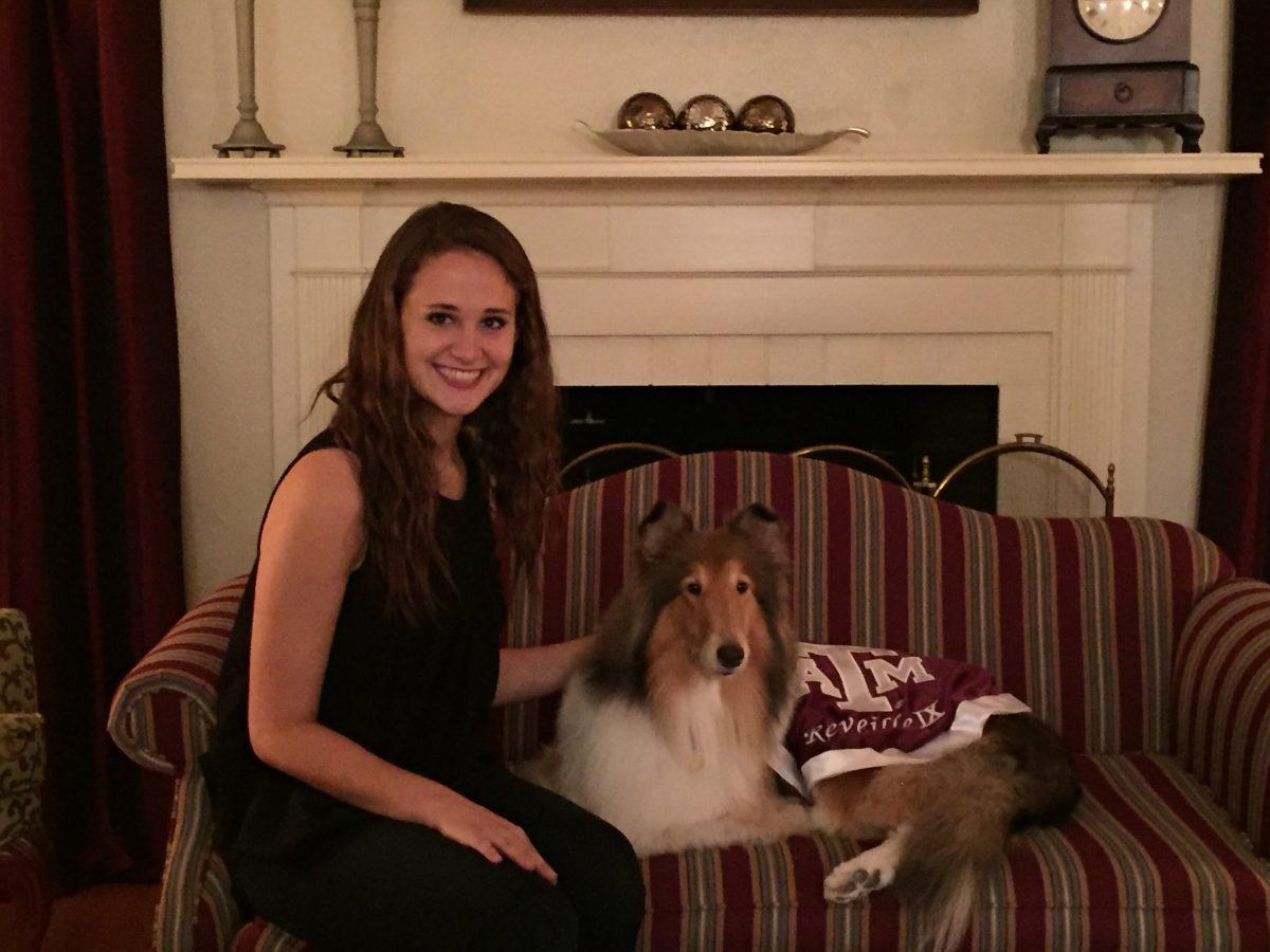 Business administration freshman Rebecca Weathers poses next to Reveille IX at a private photo shoot Oct. 5. 