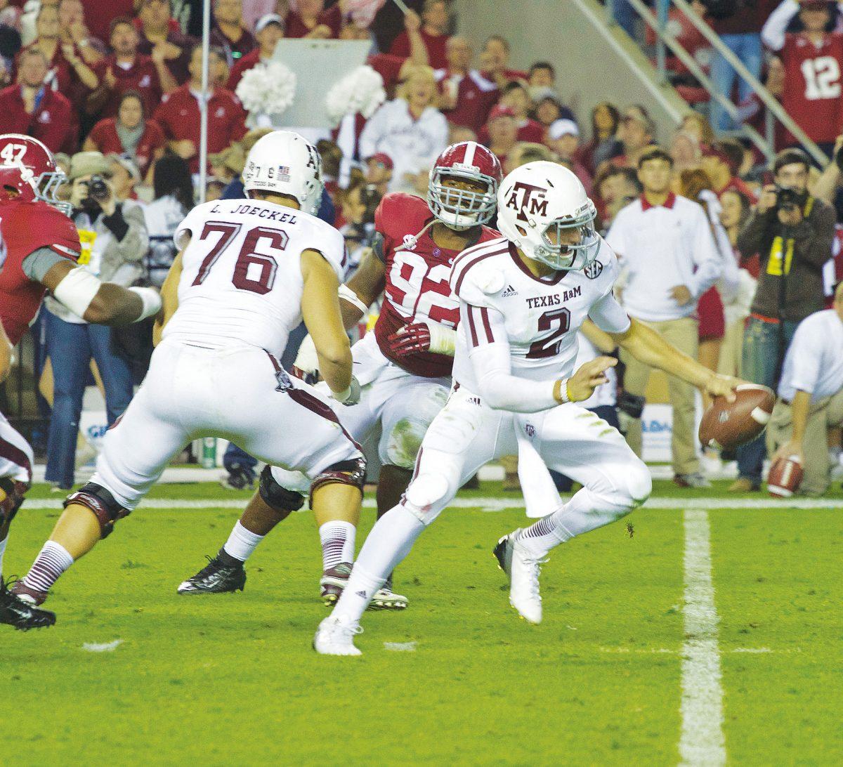 Quarterback Johnny Manziel rolls out during the matchup against Alabama on November 10, 2012. 