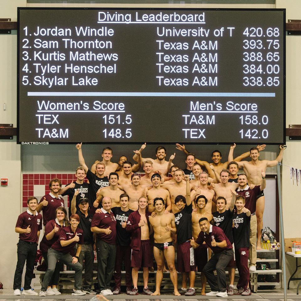 The Texas A&amp;M men's swimming team claimed its first victory in the pool over the Texas Longhorns at a dual meet Friday night.