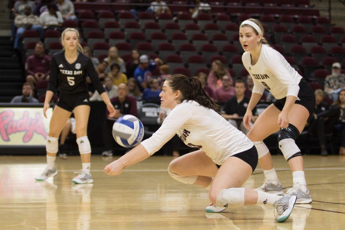 Senior&#160;Gabby Litwin picks up a dig. &#160;She led the team with 14 digs for the night.