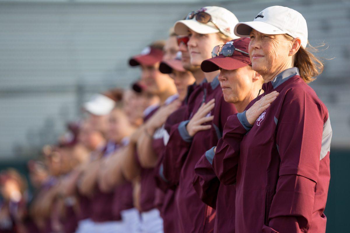 Head Coach Jo Evans and the Texas A&amp;M Softball team during the National Anthem.&#160;