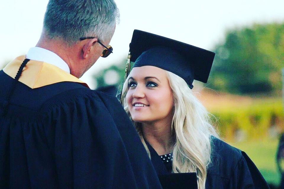 When she graduated high school, Charlie Mohr, Class of 1986 and member of the Andrews School Board, offered to pay for telecommunication media studies senior Mikenzi Schulze’s ring.