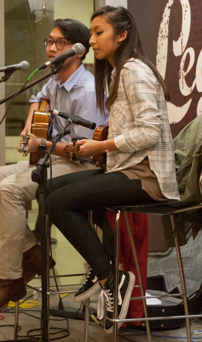 <p>Former Corps Commander and Meteorology senior <strong>Cecille Sorio</strong> performs at MSC Town Hall’s coffeehouse concert.</p>