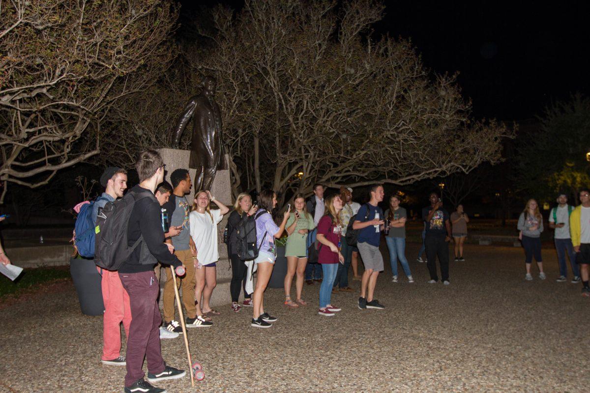 A group of students responding to the Spongebob-inspired facebook event gather in front of the Sul Ross statue to shout the iconic phrase.