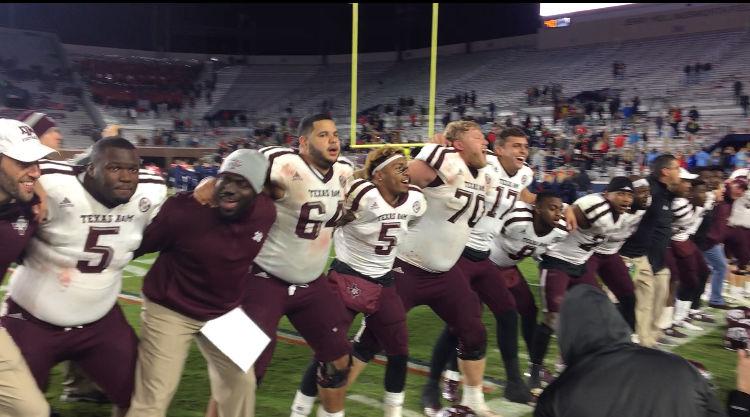 The Texas A&M football team celebrates its 31-24 win over Ole Miss by singing the Aggie War Hymn after the game.