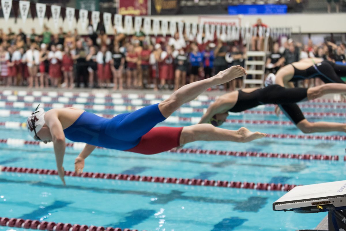 <p>Freshman <strong>Taylor Pike</strong> explodes off the block for the 200 yard IM at the Art Adamson Invitational Nov. 16.</p>