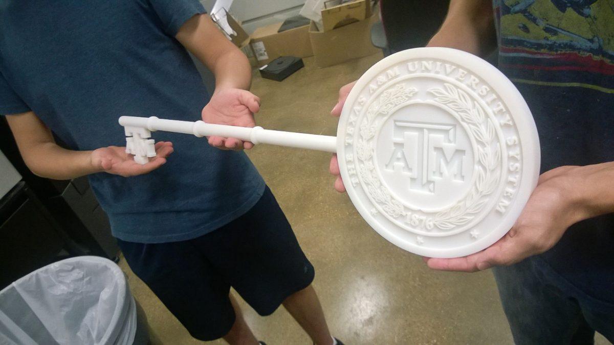 A 3-foot key with the Texas A&amp;M seal that was printed using the EIC's Polyjet printer.