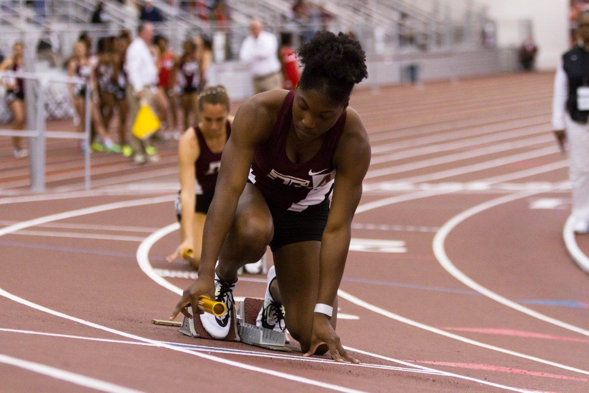 Freshman sprinter Virginia Kerley takes her mark for the beginning of the Womens 4x400 Meter Relay.