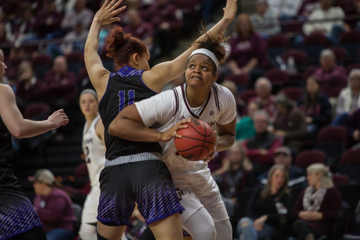 Senior Khaalia Hillsman fights passed a UCA defender looking for the shot.