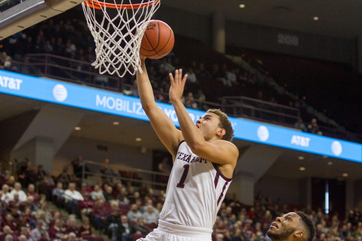 Junior forward DJ Hogg finished with 12 points for the Aggies.