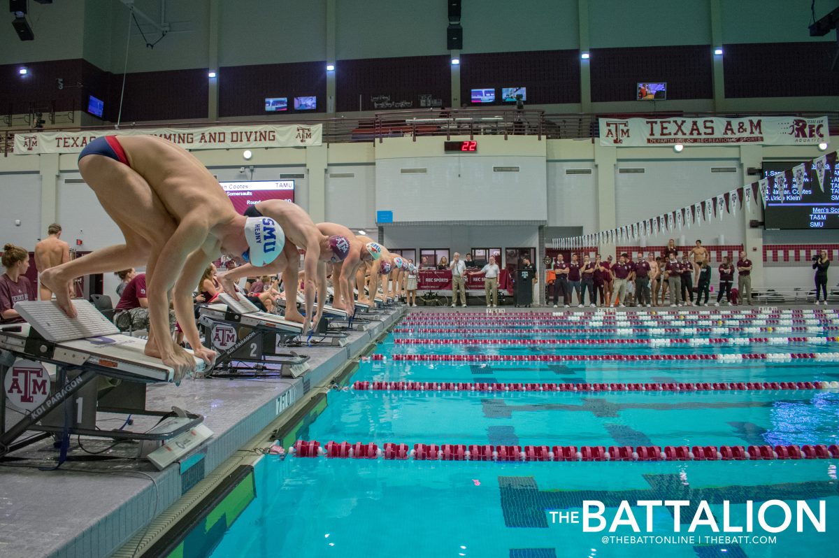 The+swimmers+of+SMU+and+Texas+A%26amp%3BM+prepare+for+the+first+race.