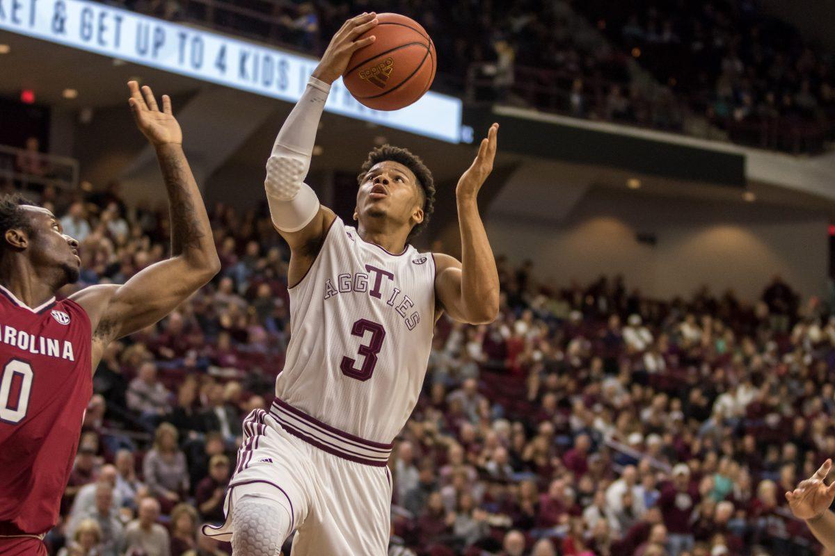 Junior Point Guard&#160;Admon Gilder attempts to score.