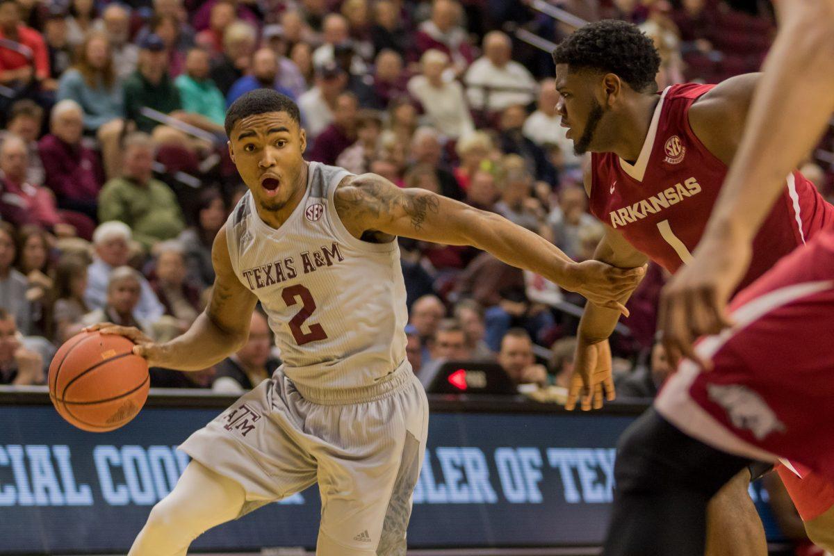 Freshmen Guard TJ Starks dribbles past the defense to score.