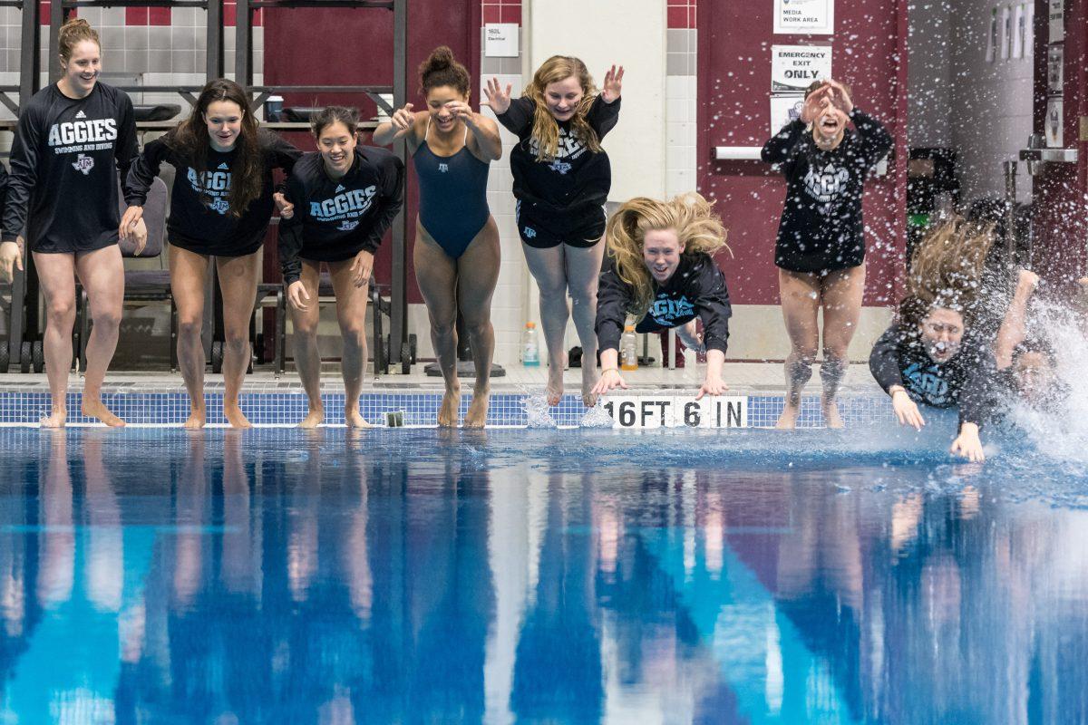The+Texas+A%26amp%3BM+Aggies+Women+jump+into+the+diving+pool+to+celebrate+their+third+straight+SEC+title.
