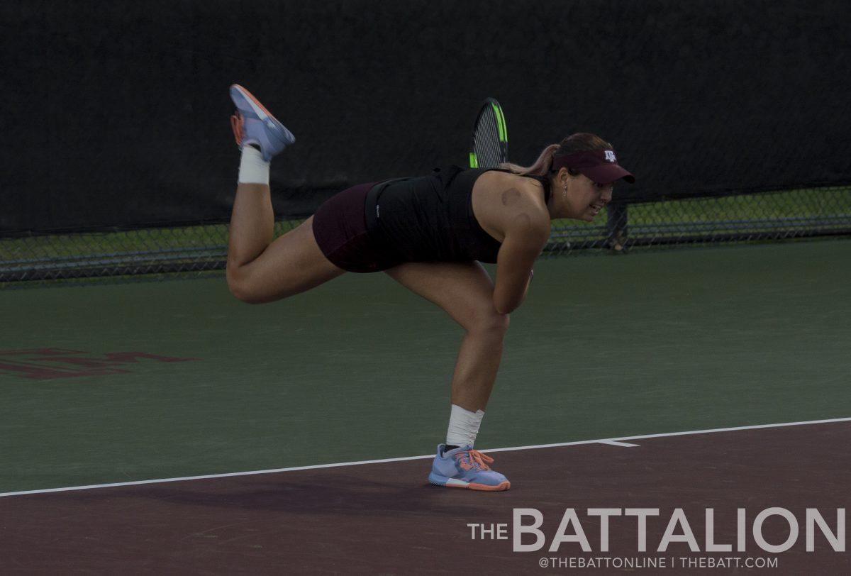 Tatiana+Makarova+serves+the+ball+over+the+net.%26%23160%3B