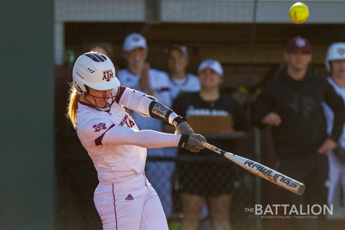 Senior Ashley Walters hits a fly ball to right field.