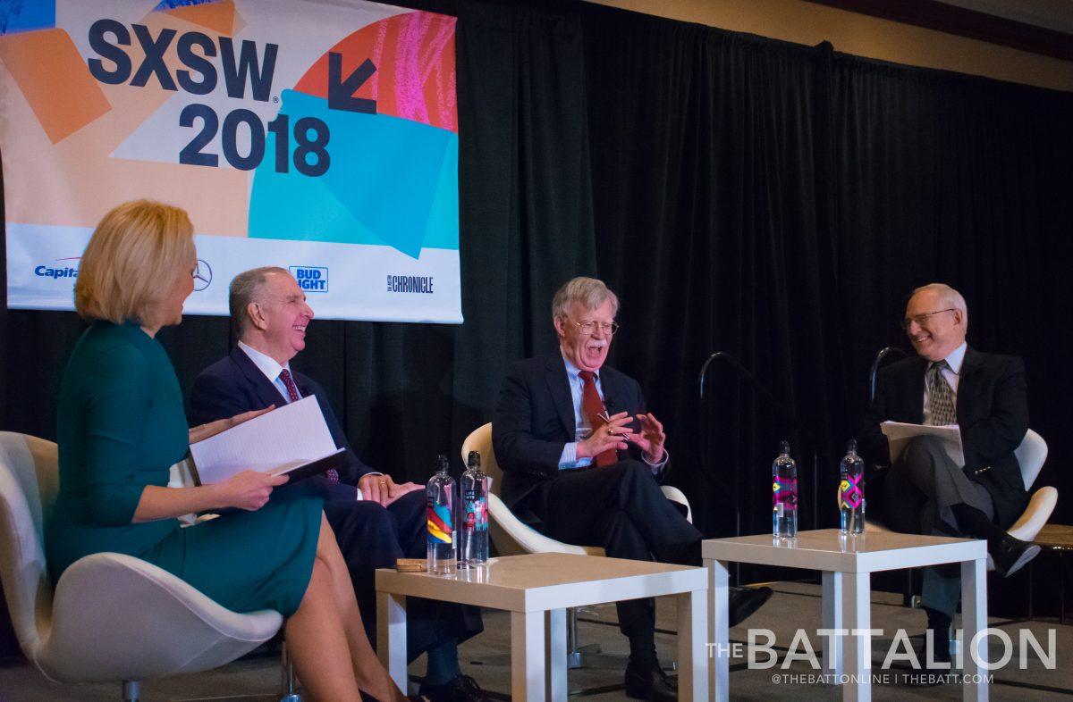 Texas A&M President Michael K. Young (second from left) partakes in a discussion panel moderated by BBCs Kasia Madera in Austin, Texas. 