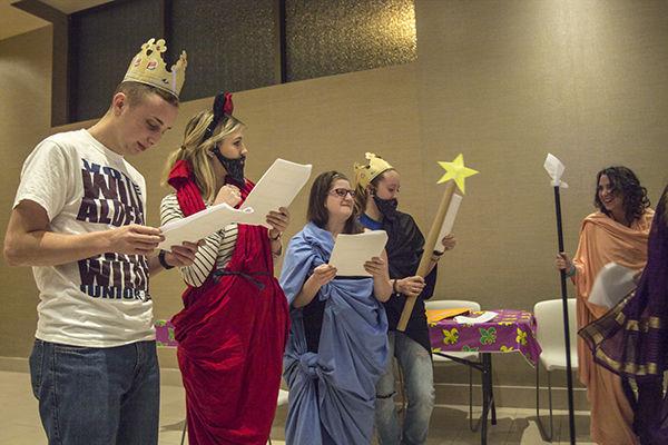 Shelby Knowles — THE BATTALION(From left to right) communication junior Dan Rosenfield, English freshman Celeste Swanson, psychology junior Rebecca Waronoff and health senior Alex Powell enact a “megillah” reading, preformed two years ago. 