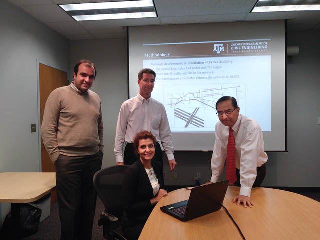 Standing (left to right):  Dr. Alireza Talebpour, Dr. Mark Burris, Dr. Kumares Sinha. Sitting: Arezoo Samimi.