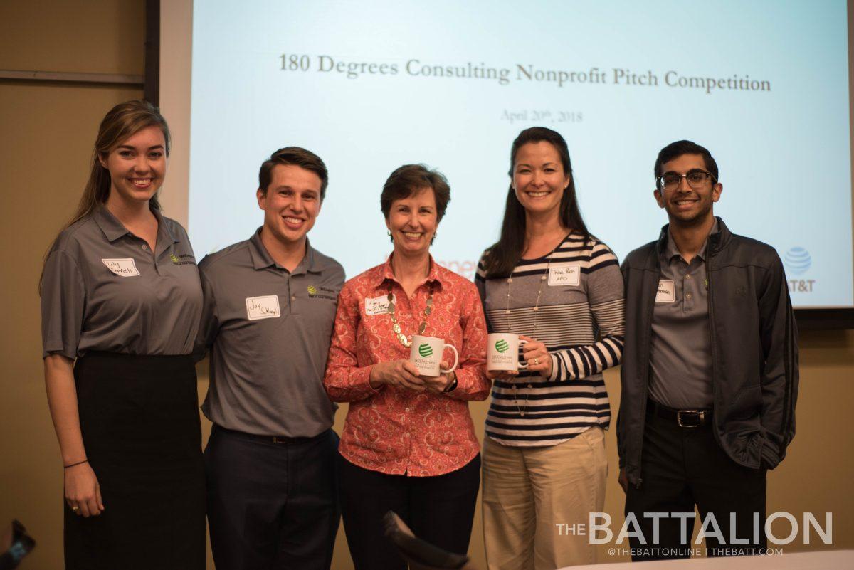 Kim Schams and Tisha Rich from Aggieland Pregnancy Outreach with students from 180 Degrees Consulting at the Nonprofit Pitch Competition.