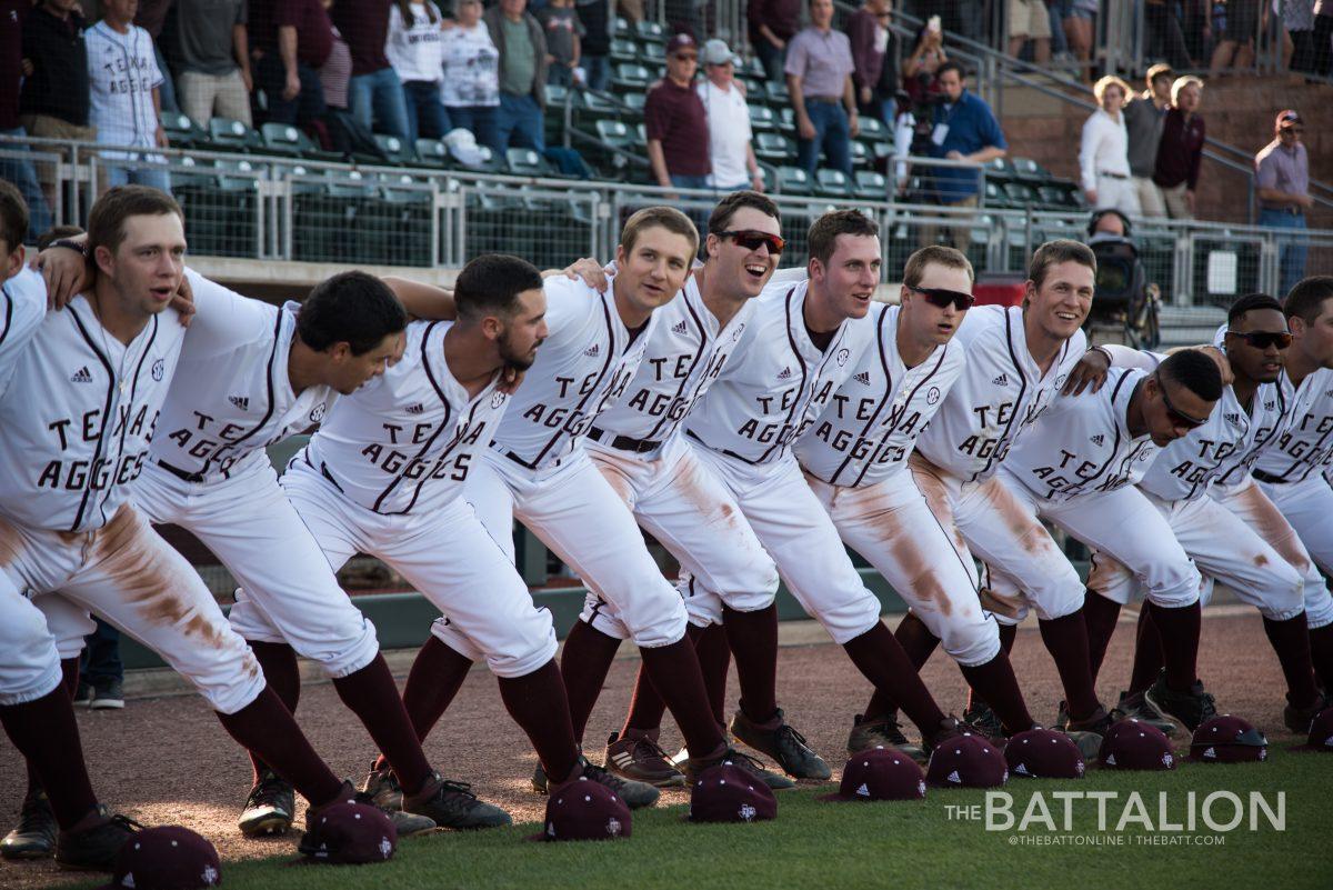 The Texas A&M baseball team sways during the War Hymn before the Tuesday matchup with the University of Texas.