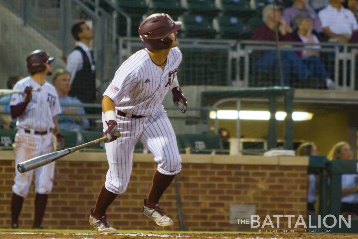 Sophomore outfielder Cam Blake runs to first base. 