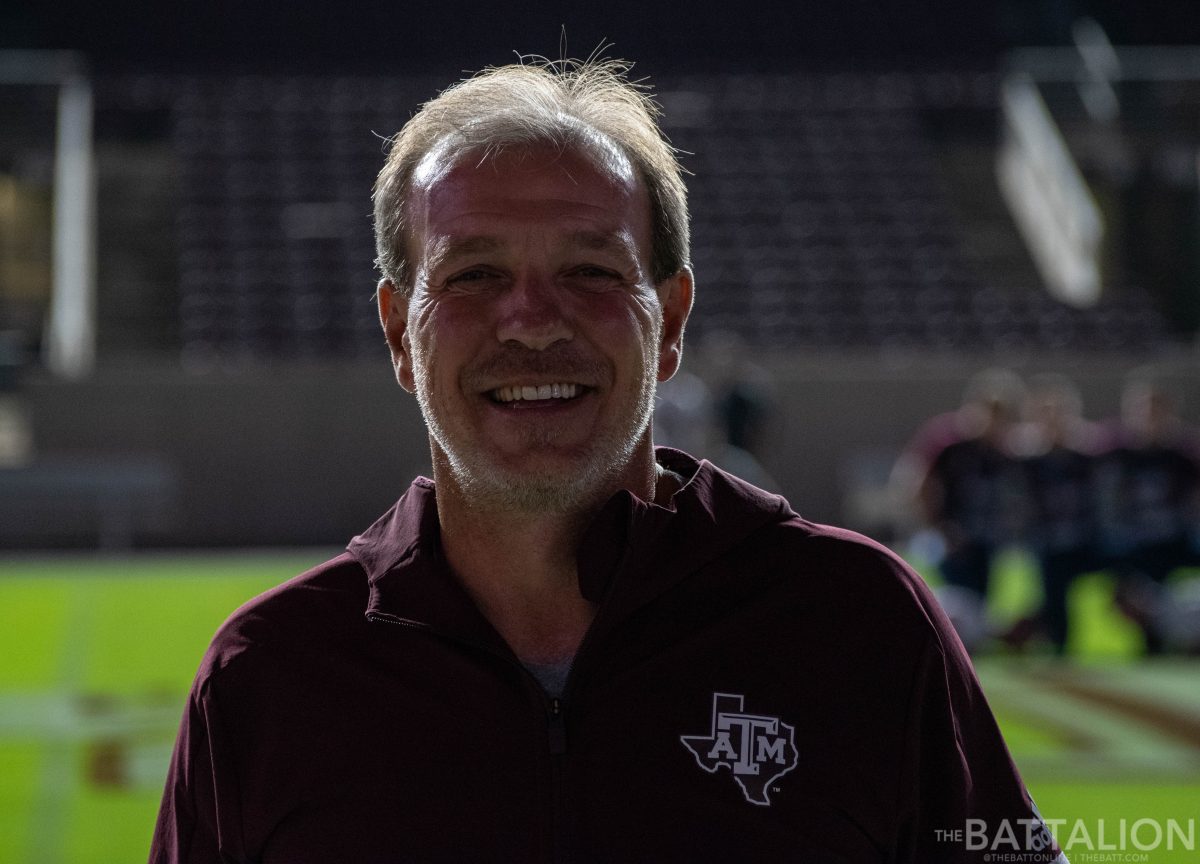 Head Coach Jimbo Fisher arrives to his very first Fightin' Texas Aggie Yell Practice while fans chanted his name.