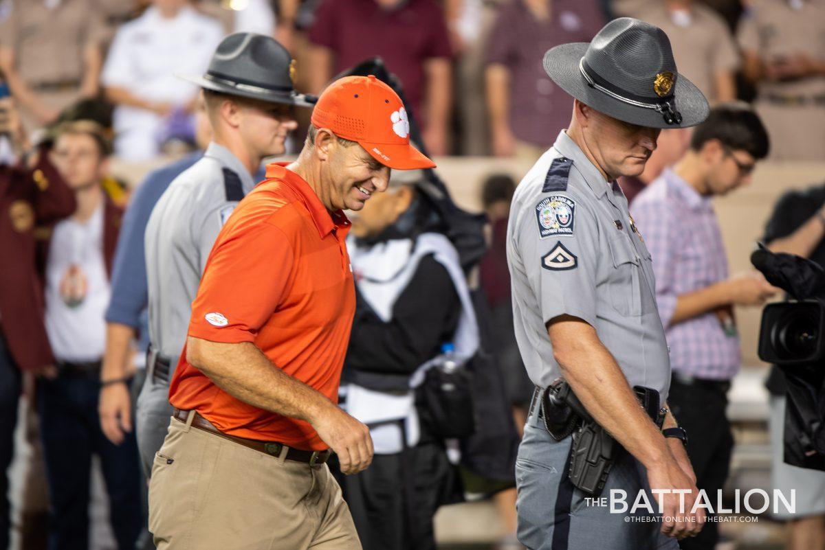 Clemson Head Coach Dabo Swinney exits Kyle Field following Clemsons 28-26 victory.