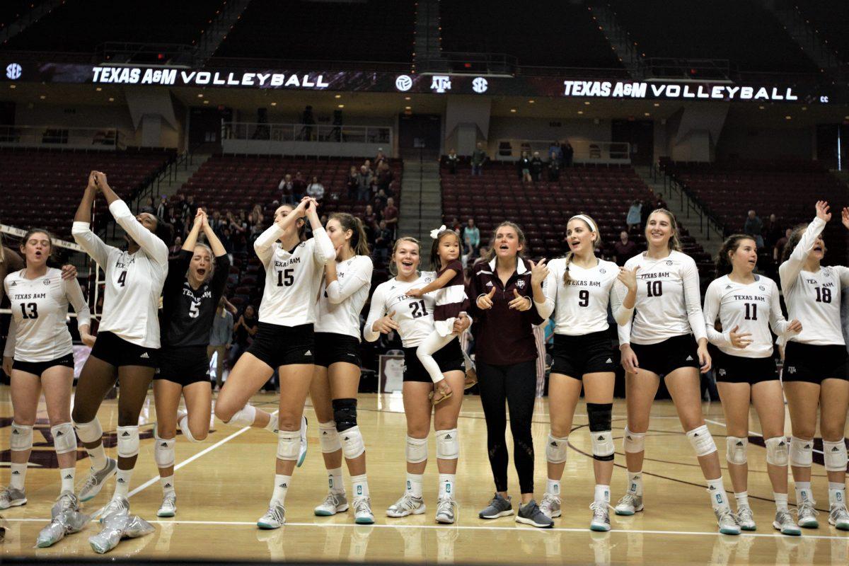 The Aggie's Volleyball team celebrate their victory at the Senior Game this Sunday with their wildcats.