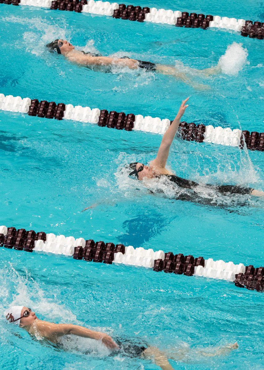 South Carolina Junior Emma Barksdale, junior Syndey Pickrem and senior Bethany Galat swim backstroke during the women's 400-yard individual medley.