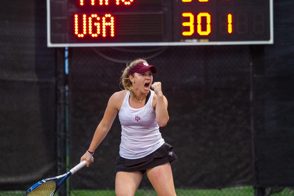 Freshman Rylan McQuaid&#160; celebrates&#160;winning a hard-fought point.