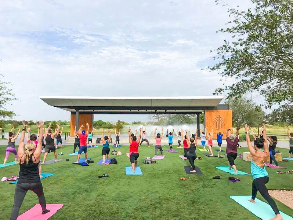 Sol+Yoga+offers+outdoor+yoga+classes%2C+including+sunrise+and+sunset+sessions+at+Lake+Walk+Town+Center%2C+to+participants+of+all+skill+levels.
