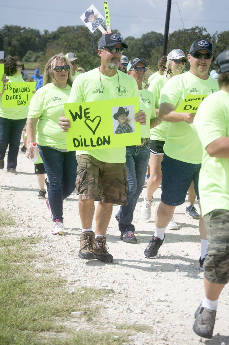The team “Dillon’s Dudes” led the Buddy Walk at Millican Reserve on Sunday morning.