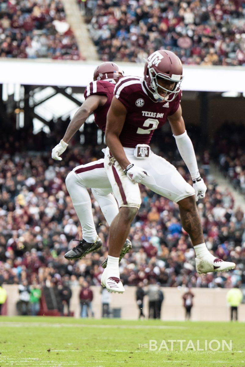 Quartney Davis and sophomore wide receiver Jhamon Ausbon celebrate Daviss touchdown.