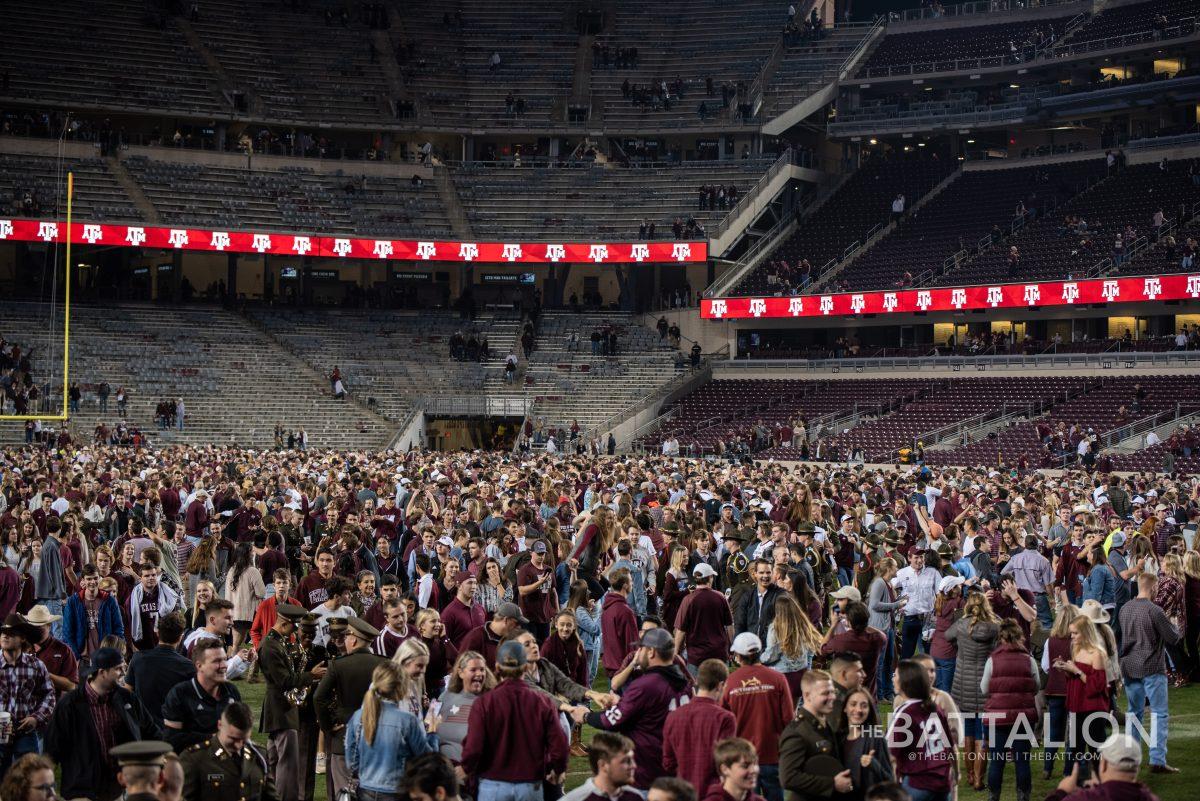 Fans rushed the field following the win.